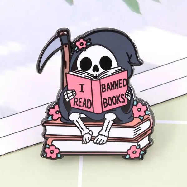 I Read Banned Books — Gothic Skeleton Reader Enamel Pin