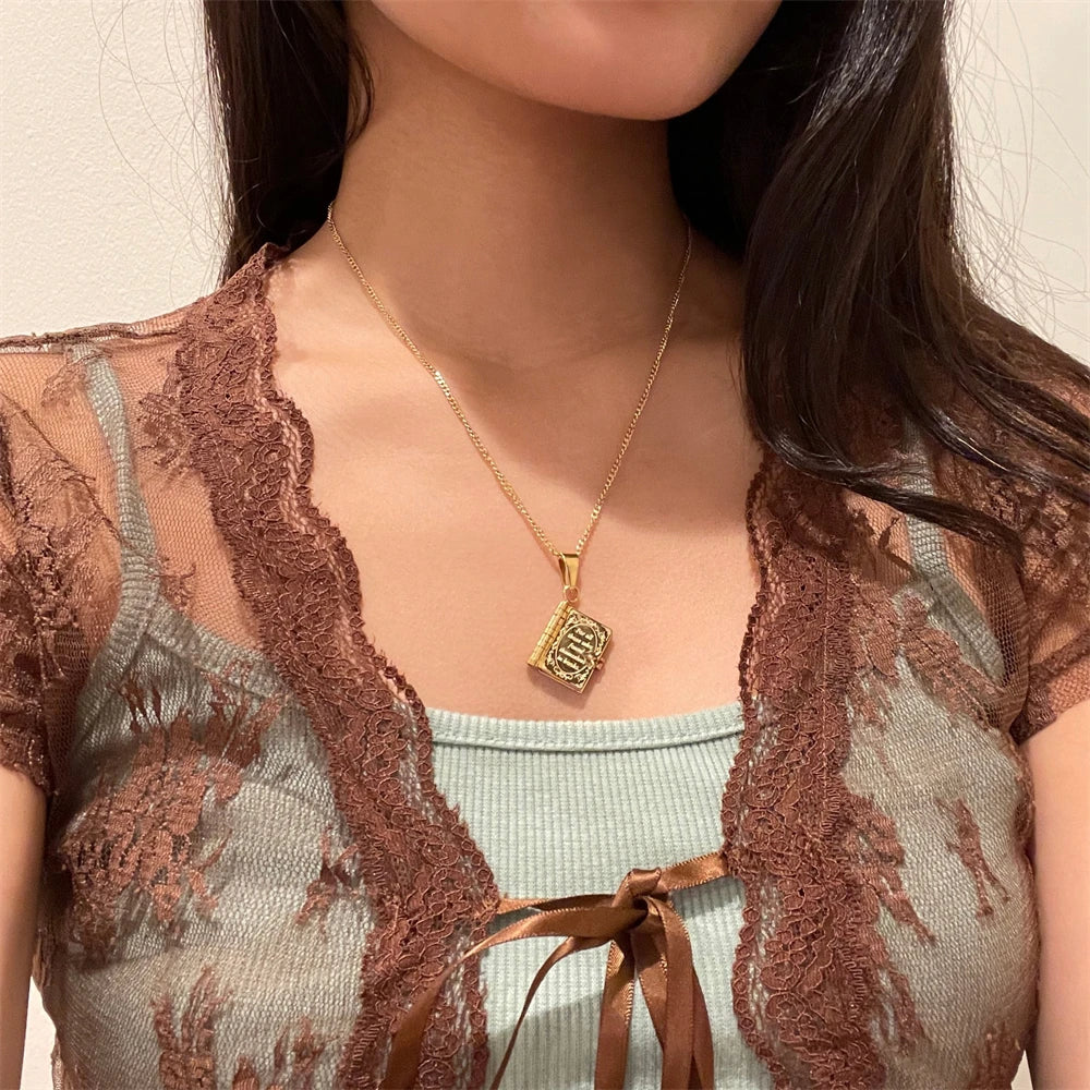 “For All Those Who Found Themselves in Books” — Engraved Book Necklace