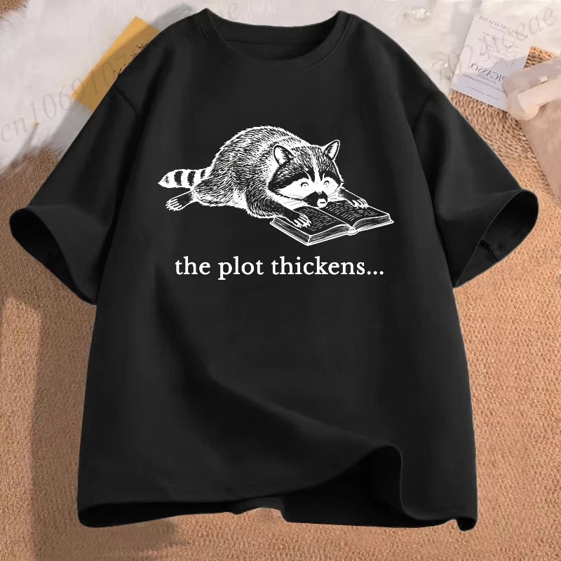 The Plot Thickens — Funny Reading Raccoon Book Lover T-Shirt