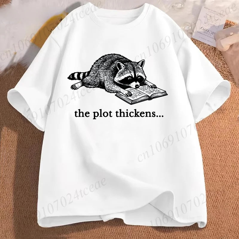 The Plot Thickens — Funny Reading Raccoon Book Lover T-Shirt