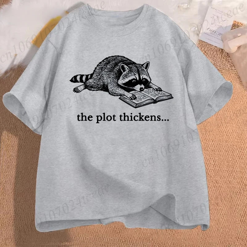The Plot Thickens — Funny Reading Raccoon Book Lover T-Shirt