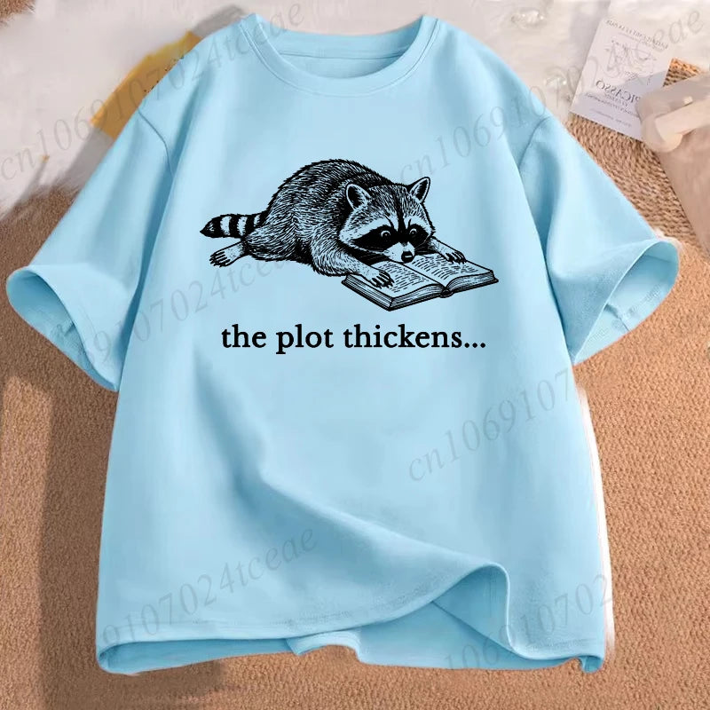 The Plot Thickens — Funny Reading Raccoon Book Lover T-Shirt